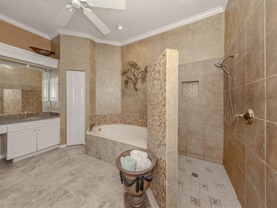 Exceptional courtyard home providing a refined blend of comfort on The Venice Golf and Country Club in Florida - for sale on GolfHomes.com, golf home, golf lot