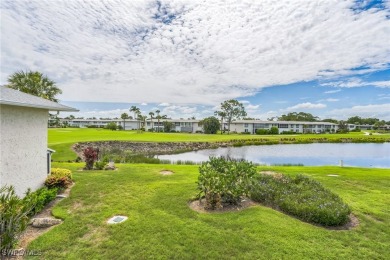 Wonderful second floor 2/2 unit looking out on the water of the on The Glades Golf and Country Club in Florida - for sale on GolfHomes.com, golf home, golf lot