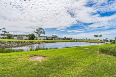 Wonderful second floor 2/2 unit looking out on the water of the on The Glades Golf and Country Club in Florida - for sale on GolfHomes.com, golf home, golf lot