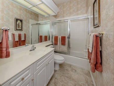 Exceptional courtyard home providing a refined blend of comfort on The Venice Golf and Country Club in Florida - for sale on GolfHomes.com, golf home, golf lot