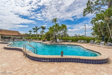Wonderful second floor 2/2 unit looking out on the water of the on The Glades Golf and Country Club in Florida - for sale on GolfHomes.com, golf home, golf lot