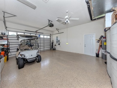 Exceptional courtyard home providing a refined blend of comfort on The Venice Golf and Country Club in Florida - for sale on GolfHomes.com, golf home, golf lot