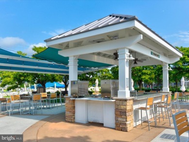 Gorgeous Peninsula two-bedroom top-floor condominium showcasing on The Peninsula Golf and Country Club in Delaware - for sale on GolfHomes.com, golf home, golf lot