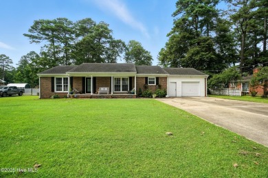 Welcome to your dream home on the north side of Elizabeth City! on The Pines At Elizabeth City in North Carolina - for sale on GolfHomes.com, golf home, golf lot