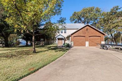 Located on a beautiful 0.87-acre treed lot with 396 feet of on Pinnacle Golf and Boat Club in Texas - for sale on GolfHomes.com, golf home, golf lot