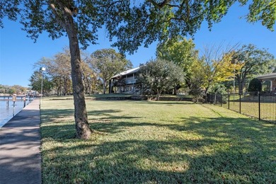 Located on a beautiful 0.87-acre treed lot with 396 feet of on Pinnacle Golf and Boat Club in Texas - for sale on GolfHomes.com, golf home, golf lot