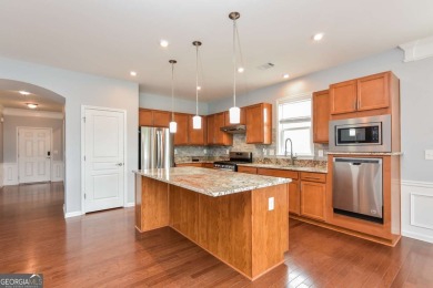 Beautiful home located in resort-style, age-qualified community on Canongate Golf At Sun City Peachtree in Georgia - for sale on GolfHomes.com, golf home, golf lot