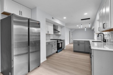 BEAUTIFULLY REMODELED GRAMERCY IN DESIRABLE STRATHMORE on Buffalo Grove Golf Club in Illinois - for sale on GolfHomes.com, golf home, golf lot
