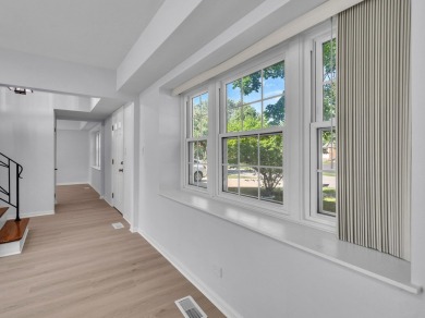 BEAUTIFULLY REMODELED GRAMERCY IN DESIRABLE STRATHMORE on Buffalo Grove Golf Club in Illinois - for sale on GolfHomes.com, golf home, golf lot
