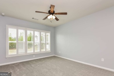 Beautiful home located in resort-style, age-qualified community on Canongate Golf At Sun City Peachtree in Georgia - for sale on GolfHomes.com, golf home, golf lot