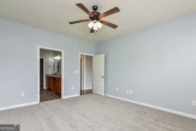Beautiful home located in resort-style, age-qualified community on Canongate Golf At Sun City Peachtree in Georgia - for sale on GolfHomes.com, golf home, golf lot