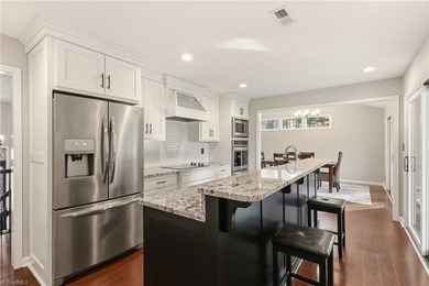 Enjoy front row golf course views from this well maintained on Forest Oaks Country Club in North Carolina - for sale on GolfHomes.com, golf home, golf lot