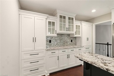 Enjoy front row golf course views from this well maintained on Forest Oaks Country Club in North Carolina - for sale on GolfHomes.com, golf home, golf lot