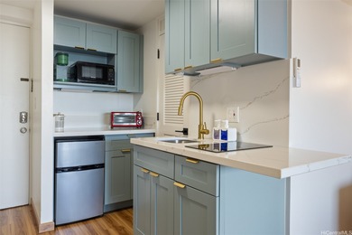 Discover this exceptional Studio condo, completely transformed on Ala Wai Golf Course in Hawaii - for sale on GolfHomes.com, golf home, golf lot