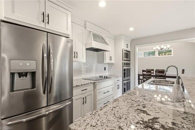 Enjoy front row golf course views from this well maintained on Forest Oaks Country Club in North Carolina - for sale on GolfHomes.com, golf home, golf lot