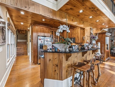 Minutes from Lake Toxaway Country Club, the marina, and the on Lake Toxaway Country Club in North Carolina - for sale on GolfHomes.com, golf home, golf lot