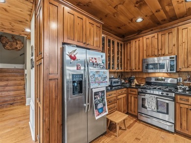 Minutes from Lake Toxaway Country Club, the marina, and the on Lake Toxaway Country Club in North Carolina - for sale on GolfHomes.com, golf home, golf lot