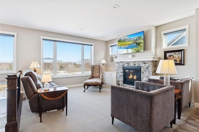 Stunning and well appointed three bedroom, three bathroom on Cimarron Park Golf Course in Minnesota - for sale on GolfHomes.com, golf home, golf lot