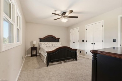 Enjoy front row golf course views from this well maintained on Forest Oaks Country Club in North Carolina - for sale on GolfHomes.com, golf home, golf lot