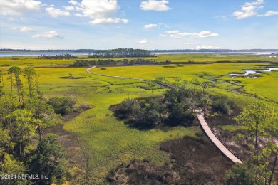 This stunning 2.2-acre waterfront/marsh-front estate lot is the on The Palencia Club in Florida - for sale on GolfHomes.com, golf home, golf lot