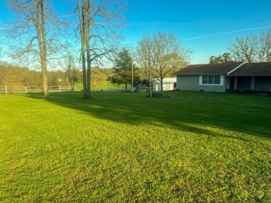 Wake Lane is located just outside of town in Willow Springs on Willow Springs Municipal Golf Course in Missouri - for sale on GolfHomes.com, golf home, golf lot