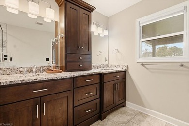 Enjoy front row golf course views from this well maintained on Forest Oaks Country Club in North Carolina - for sale on GolfHomes.com, golf home, golf lot