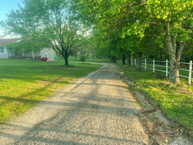 Wake Lane is located just outside of town in Willow Springs on Willow Springs Municipal Golf Course in Missouri - for sale on GolfHomes.com, golf home, golf lot