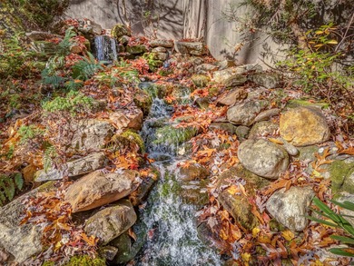 Minutes from Lake Toxaway Country Club, the marina, and the on Lake Toxaway Country Club in North Carolina - for sale on GolfHomes.com, golf home, golf lot