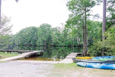 Beautifully reimagined and loved, 4 Riverdale Drive is a rare on Tchefuncta Country Club in Louisiana - for sale on GolfHomes.com, golf home, golf lot