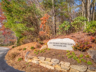 Minutes from Lake Toxaway Country Club, the marina, and the on Lake Toxaway Country Club in North Carolina - for sale on GolfHomes.com, golf home, golf lot