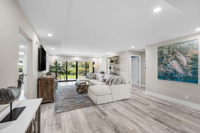 Welcome to this inviting 1st‑floor home showcasing serene on Quail Ridge Golf Course and Country Club in Florida - for sale on GolfHomes.com, golf home, golf lot
