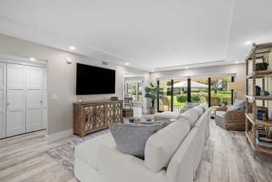 Welcome to this inviting 1st‑floor home showcasing serene on Quail Ridge Golf Course and Country Club in Florida - for sale on GolfHomes.com, golf home, golf lot