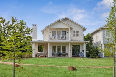 This Heron Porch Home blends Low Country charm with elevated on Long Cove Golf Course in Texas - for sale on GolfHomes.com, golf home, golf lot