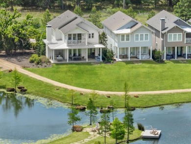 This Heron Porch Home blends Low Country charm with elevated on Long Cove Golf Course in Texas - for sale on GolfHomes.com, golf home, golf lot