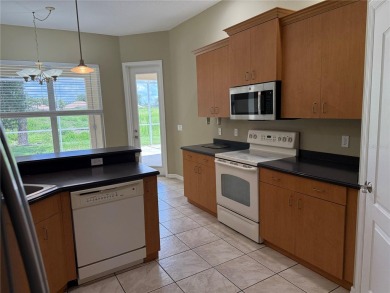 Welcome to this charming 3-bedroom, 2-bathroom home that has on Bobcat Trail Golf Club in Florida - for sale on GolfHomes.com, golf home, golf lot