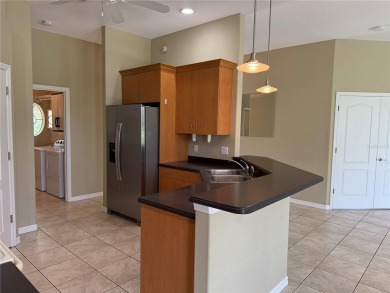 Welcome to this charming 3-bedroom, 2-bathroom home that has on Bobcat Trail Golf Club in Florida - for sale on GolfHomes.com, golf home, golf lot