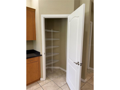 Welcome to this charming 3-bedroom, 2-bathroom home that has on Bobcat Trail Golf Club in Florida - for sale on GolfHomes.com, golf home, golf lot