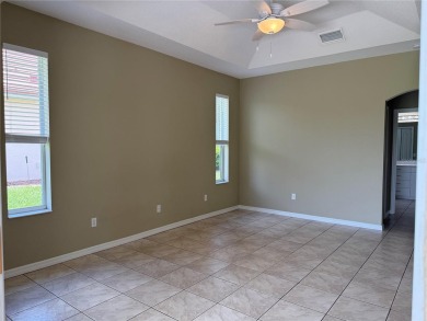 Welcome to this charming 3-bedroom, 2-bathroom home that has on Bobcat Trail Golf Club in Florida - for sale on GolfHomes.com, golf home, golf lot
