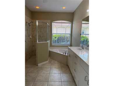 Welcome to this charming 3-bedroom, 2-bathroom home that has on Bobcat Trail Golf Club in Florida - for sale on GolfHomes.com, golf home, golf lot