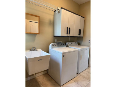Welcome to this charming 3-bedroom, 2-bathroom home that has on Bobcat Trail Golf Club in Florida - for sale on GolfHomes.com, golf home, golf lot