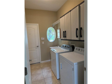 Welcome to this charming 3-bedroom, 2-bathroom home that has on Bobcat Trail Golf Club in Florida - for sale on GolfHomes.com, golf home, golf lot
