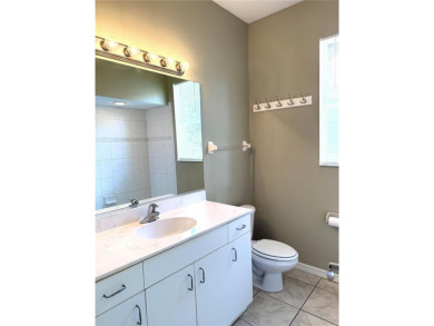 Welcome to this charming 3-bedroom, 2-bathroom home that has on Bobcat Trail Golf Club in Florida - for sale on GolfHomes.com, golf home, golf lot