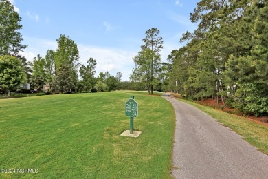 Perfectly situated with GOLF course views from the tee box all on Magnolia Greens Golf Plantation in North Carolina - for sale on GolfHomes.com, golf home, golf lot