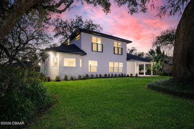 Set on an expansive golf course lot with mature, lush on Spruce Creek Golf Club in Florida - for sale on GolfHomes.com, golf home, golf lot