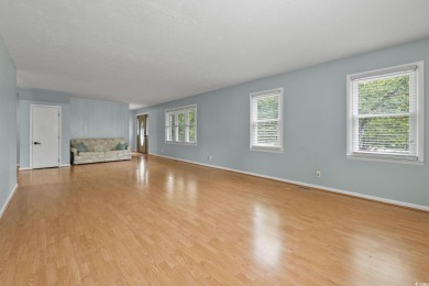 Welcome to 917 9th Avenue S, a spacious 4-bedroom, 3-bathroom on Possum Trot Golf Course in South Carolina - for sale on GolfHomes.com, golf home, golf lot