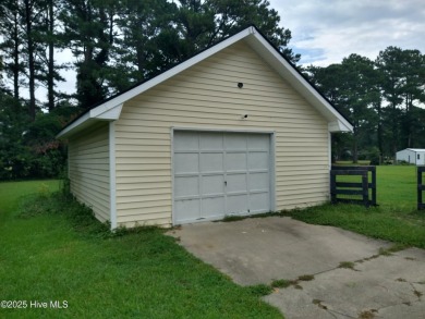Spacious three bedroom with an additional bonus room on Rock Creek Country Club in North Carolina - for sale on GolfHomes.com, golf home, golf lot