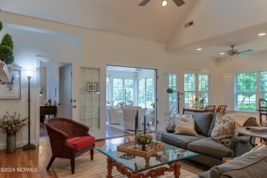 Situated on a picturesque half-acre lot, this beautiful home on Beau Rivage Golf and Resort in North Carolina - for sale on GolfHomes.com, golf home, golf lot