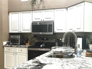 Welcome to this Beautifully maintained 2-bedroom, 2-bath home on Twisted Oaks Golf Club in Florida - for sale on GolfHomes.com, golf home, golf lot