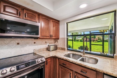 Welcome to your forever home located in the sought-after on Carrollwood Country Club in Florida - for sale on GolfHomes.com, golf home, golf lot