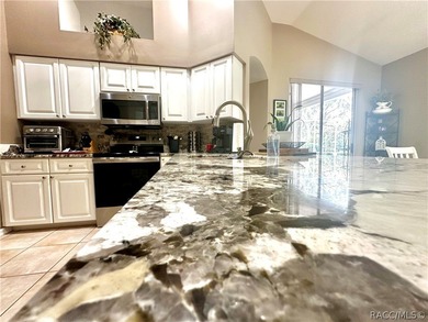 Welcome to this Beautifully maintained 2-bedroom, 2-bath home on Twisted Oaks Golf Club in Florida - for sale on GolfHomes.com, golf home, golf lot